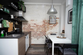 Stay by the Andrejsala area with Free Parking and reach the Old Town in 15 min walk, Riga